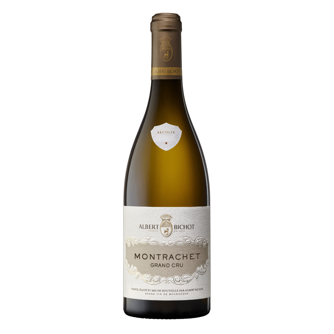 Bottle of Albert Bichot Montrachet Grand Cru 2023, a Chardonnay white wine from Burgundy, France.
