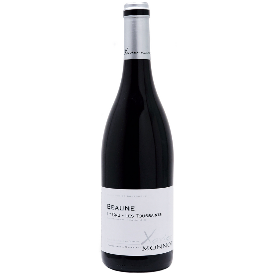 Bottle of Xavier Monnot Les Toussaints 2021, a Pinot Noir red wine from Beaune, France.