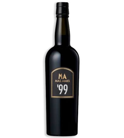 Bottle of Mas Amiel Maury Millésime 1999, a fortified Maury dessert wine from Languedoc-Roussillon, France.